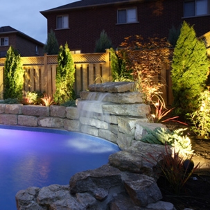 a swimming pool with falls