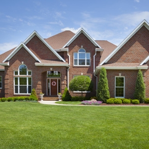 a house with simple yet classy lawn landscape