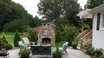 An outdoor patio area with furniture Photo