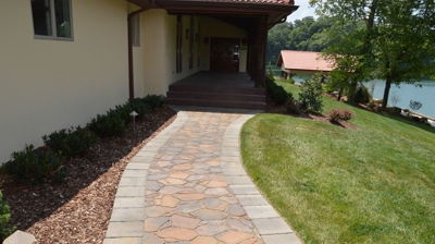 Stone path to lakefront house Photo